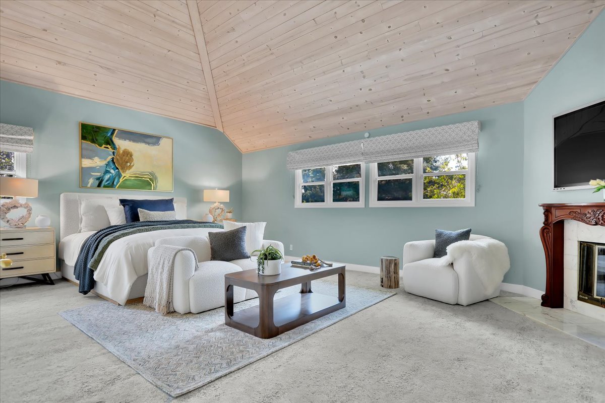 Primary suite with vaulted ceilings