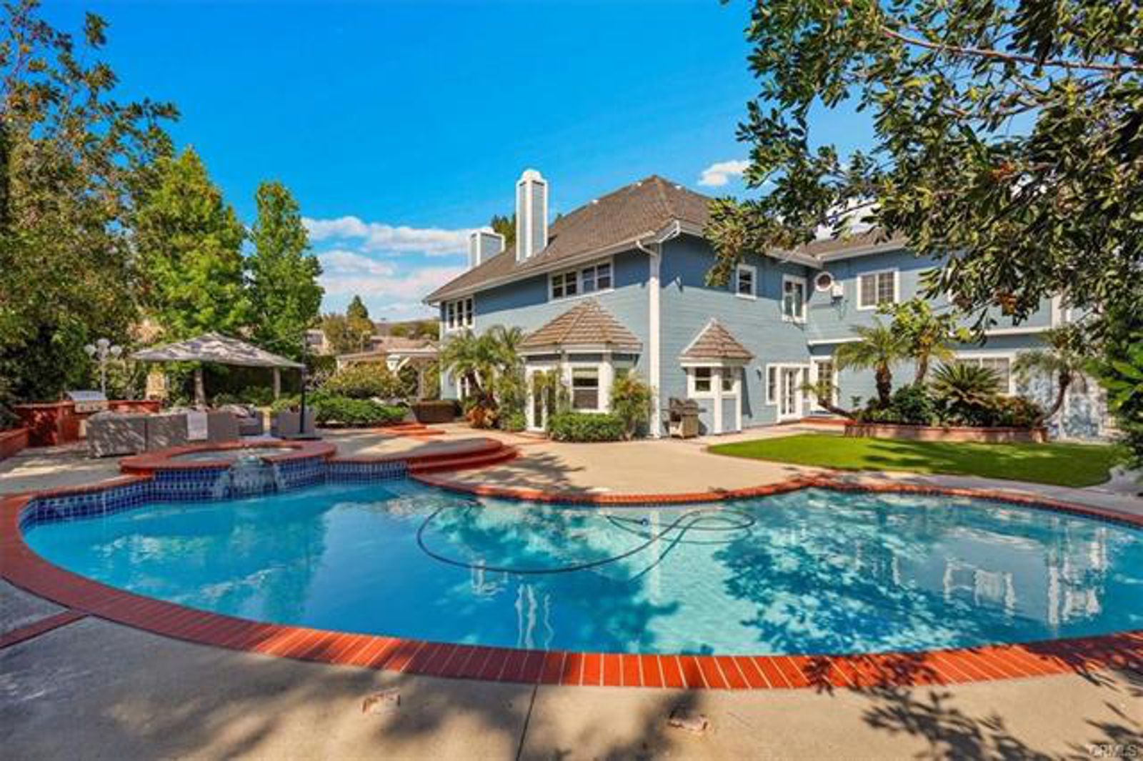 Resort pool and grounds at golden hour, 4085 Live Oak Lane